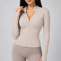 veste-de-sport-femme-col-montant-avec-zip-coupe-slim-manches-longues-pour-entrainement-et-hiver-couleur-08-beige