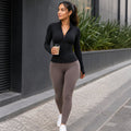 veste-de-sport-femme-col-montant-avec-zip-coupe-slim-manches-longues-pour-entrainement-et-hiver-lifestyle-01