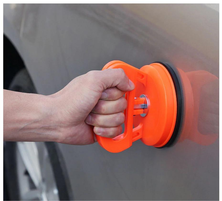 Répareur de Carrosserie Automobile par Aspiration