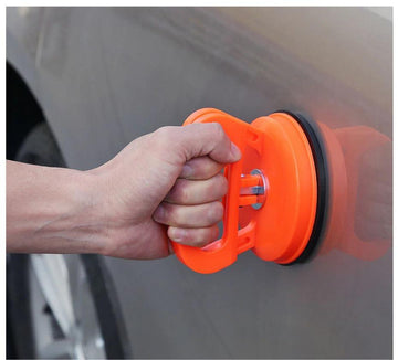Répareur de Carrosserie Automobile par Aspiration